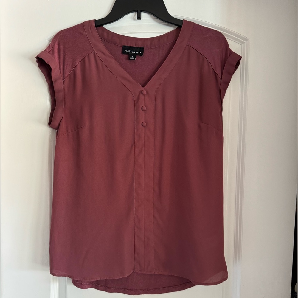 Cranberry/wine colored top. Worn a few times. Size small.